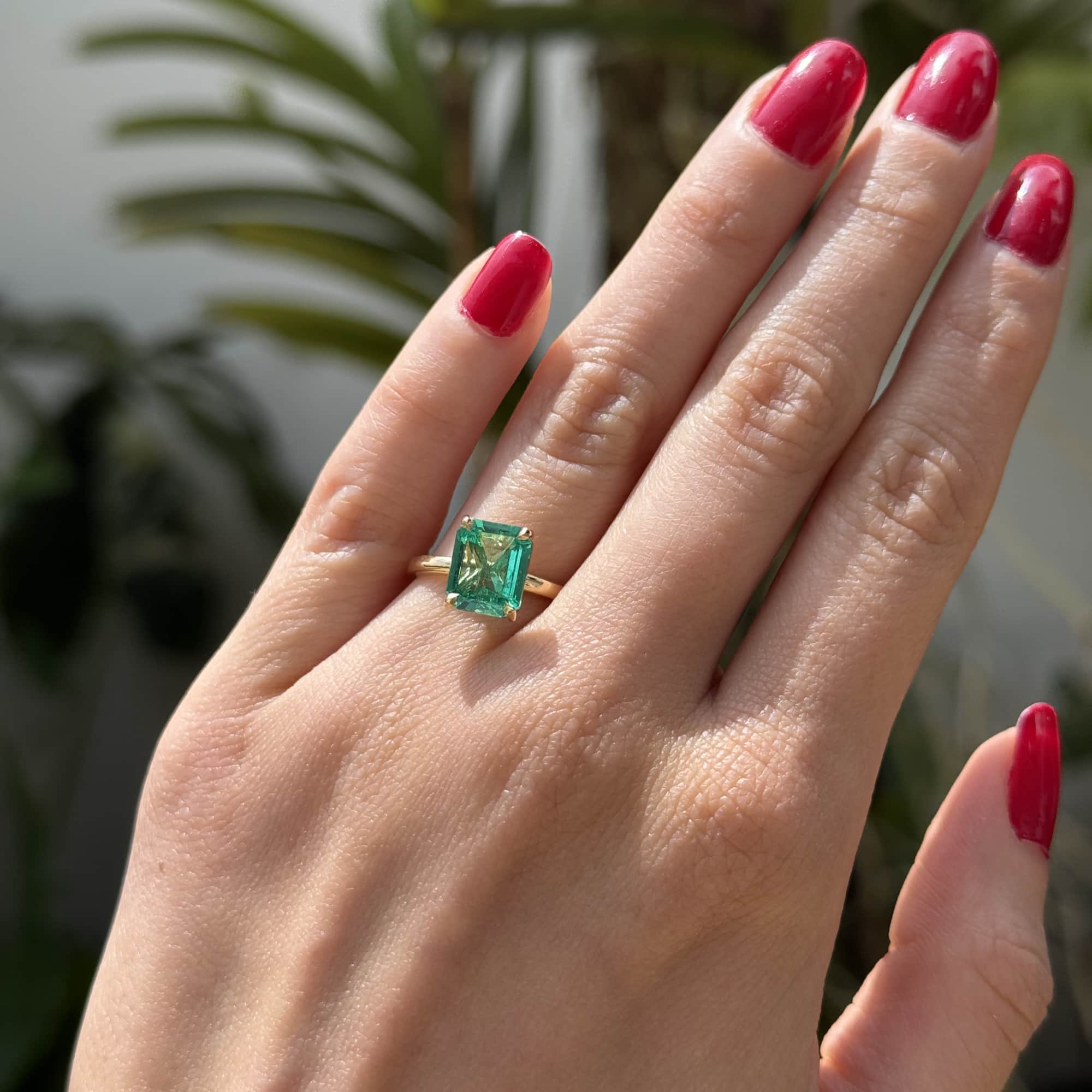 Solitaire Emerald Engagement Ring