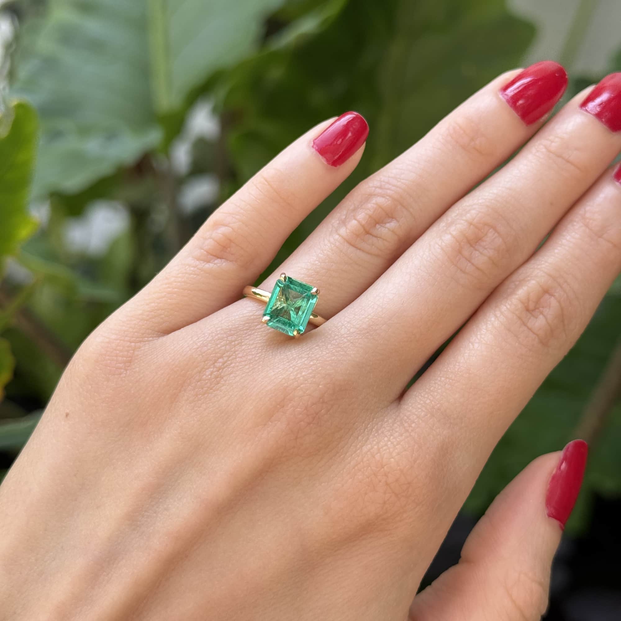 Solitaire Emerald Engagement Ring